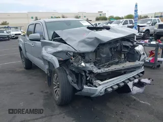 2021 Toyota Tacoma SR with VIN 3TMCZ5AN2MM405869, listed as a IAAI auction lot 42094533 with 78,449 mi miles and . Bid and sale history available at DreamBid. Image 14.