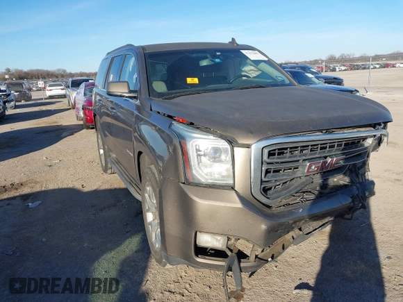 2015 GMC Yukon SLE with VIN 1GKS1AKCXFR712897, listed as a IAAI auction lot 41357889 with 1 mi miles. Bid and sale history available at carsss.com. Image 1.