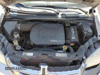 2013 Dodge Grand Caravan SXT with VIN 2C4RDGCG0DR582254, listed as a Copart auction lot 54735205 with 126,071 mi miles and Salvage Title. Bid and sale history available at DreamBid. Image 12.