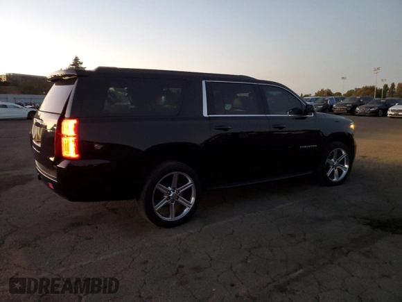 2020 Chevrolet Suburban LS with VIN 1GNSCGKC9LR104008, listed as a Copart auction lot 73351014 with 63,474 mi miles and Salvage title. Bid and sale history available at DreamBid. Image 3.