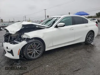 2021 BMW 3 Series 330i with VIN 3MW5R1J0XM8B48990, listed as a Copart auction lot 49277185 with 69,776 mi miles and Salvage Title. Bid and sale history available at carsss.com. Image 1.
