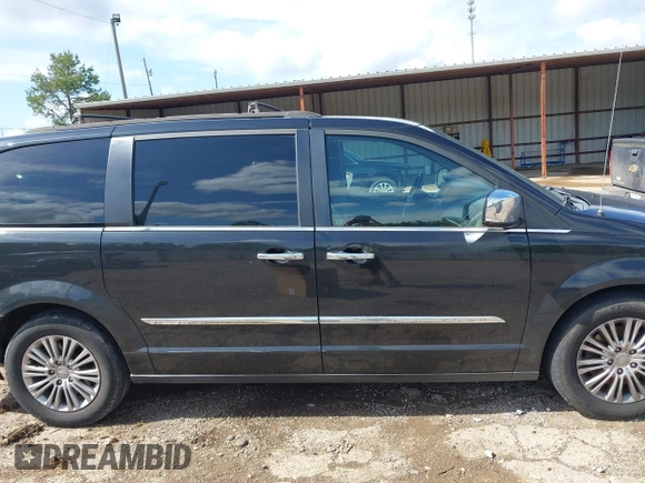 2015 Chrysler Town & Country Touring L with VIN 2C4RC1CG4FR509973, listed as a IAAI auction lot 42121743 with 199,183 mi miles and . Bid and sale history available at carsss.com. Image 13.
