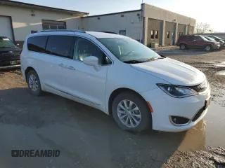 2018 Chrysler Pacifica Touring L with VIN 2C4RC1BG8JR124054, listed as a Copart auction lot 49787405 with 123,801 mi miles and Salvage Title. Bid and sale history available at DreamBid. Image 4.