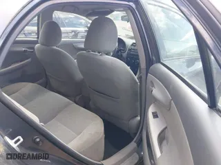 2010 Toyota Corolla with VIN 2T1BU4EE0AC521946, listed as a IAAI auction lot 42049301 with 169,807 mi miles. Bid and sale history available at carsss.com. Image 8.