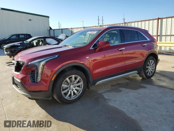 2020 Cadillac XT4 FWD Premium Luxury z VIN 1GYFZCR49LF085682, wystawiony jako Copart lot #47274325 z przebiegiem 52 834 mil mil oraz Szkody całkowita. Historia ofert i sprzedaży dostępna na DreamBid. Obrazek 1.