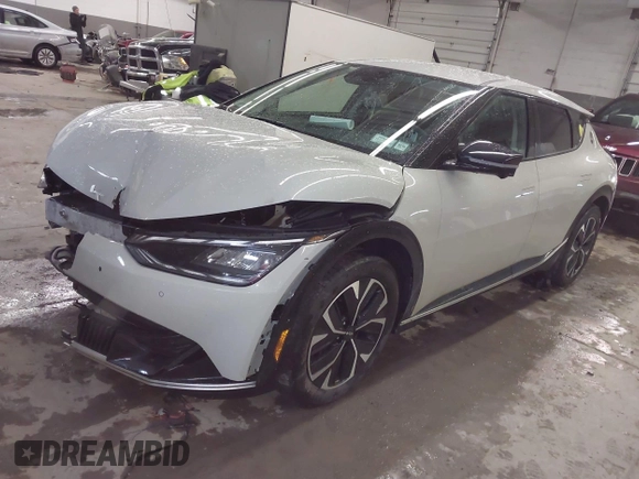 2022 Kia EV6 Wind z VIN KNDC3DLC5N5088331, wystawiony jako IAAI lot #41683097 z przebiegiem 37 380 mil mil oraz . Historia ofert i sprzedaży dostępna na DreamBid. Obrazek 18.
