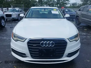 2014 Audi A6 Prestige with VIN WAUHGAFCXEN091050, listed as a IAAI auction lot 42524560 with 169,575 mi miles and . Bid and sale history available at DreamBid. Image 12.