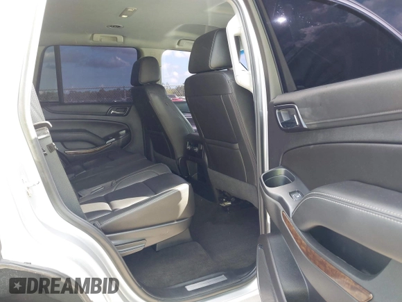 2018 Chevrolet Tahoe LT with VIN 1GNSCBKCXJR367852, listed as a IAAI auction lot 41549304 with 151,684 mi miles and . Bid and sale history available at DreamBid. Image 8.
