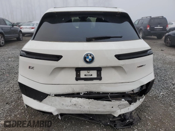 2023 BMW iX xDrive50 with VIN WB523CF04PCL67044, listed as a Copart auction lot 82805014 with 12,858 mi miles and Salvage Title. Bid and sale history available at carsss.com. Image 6.