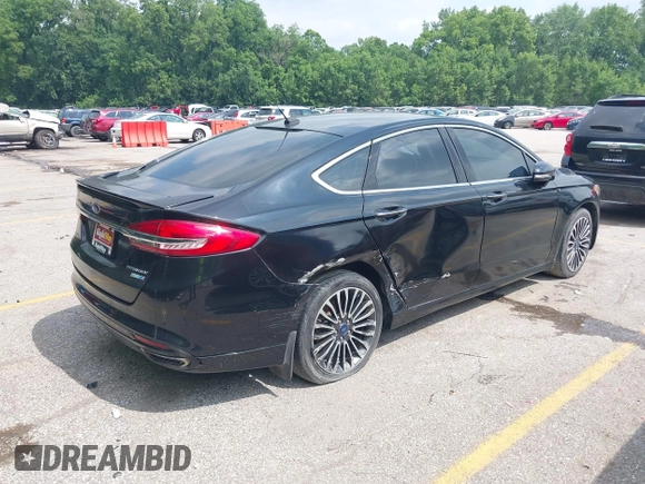 2017 Ford Fusion Titanium with VIN 3FA6P0D92HR252476, listed as a IAAI auction lot 40176942 with 88,818 mi miles and . Bid and sale history available at DreamBid. Image 4.