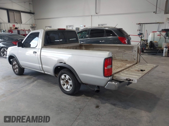 1998 Nissan Frontier XE with VIN 1N6DD21S9WC331083, listed as a IAAI auction lot 42202743 with 205,221 mi miles and . Bid and sale history available at DreamBid. Image 3.