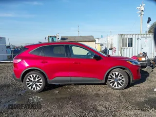 2020 Ford Escape SE Sport Hybrid with VIN 1FMCU0BZ0LUC58668, listed as a IAAI auction lot 41959552 with 77,838 mi miles and . Bid and sale history available at DreamBid. Image 13.