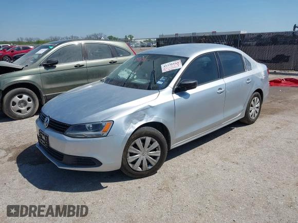 2014 Volkswagen Jetta Sedan S with VIN 3VW2K7AJ3EM310020, listed as a IAAI auction lot 41338164 with 76,456 mi miles. Bid and sale history available at carsss.com. Image 2.