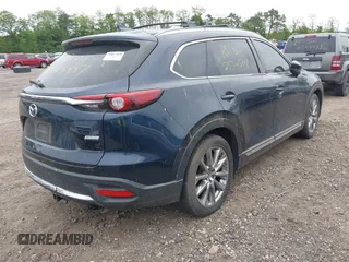2018 Mazda CX-9 Grand Touring with VIN JM3TCBDY8J0209737, listed as a IAAI auction lot 42374826 with Not provided miles and . Bid and sale history available at DreamBid. Image 4.