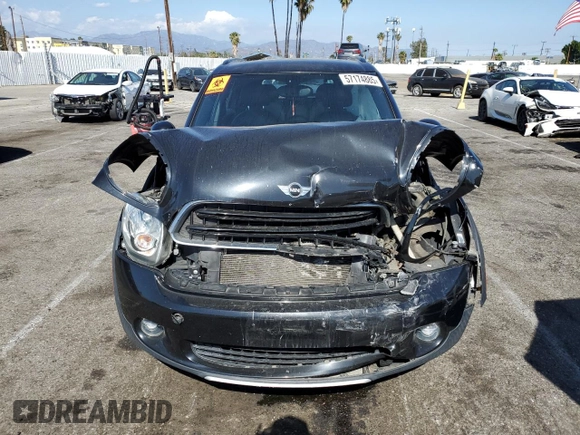 2016 MINI Countryman with VIN WMWZB3C58GWR47074, listed as a Copart auction lot 57174885 with 83,062 mi miles and Salvage title. Bid and sale history available at DreamBid. Image 5.