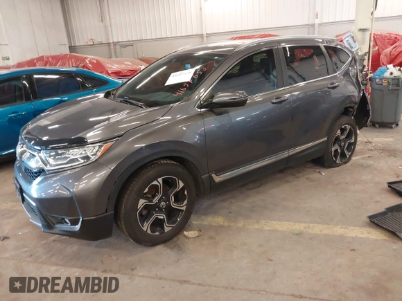 2018 Honda CR-V Touring with VIN 2HKRW2H91JH634457, listed as a IAAI auction lot 41697658 with 101,878 mi miles. Bid and sale history available at carsss.com. Image 2.