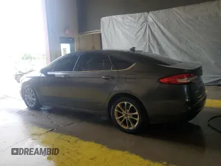 2020 Ford Fusion SE z VIN 3FA6P0HD4LR213055, wystawiony jako Copart lot #63552665 z przebiegiem 126 005 mil mil oraz Czysty tytuł • Clean title. Historia ofert i sprzedaży dostępna na DreamBid. Obrazek 2.