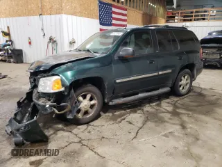 2005 GMC Envoy SLE z VIN 1GKDT13S452311376, wystawiony jako Copart lot #43277045 z przebiegiem 140 219 mil mil oraz Szkody całkowita. Historia ofert i sprzedaży dostępna na DreamBid. Obrazek 1.