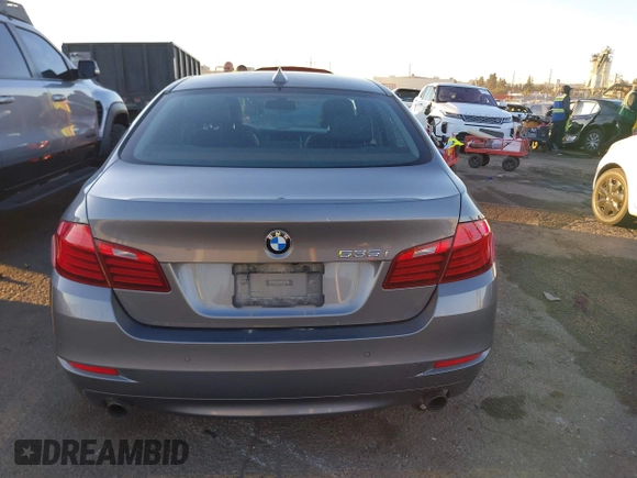 2014 BMW 5 Series 535i with VIN WBA5B1C54ED479873, listed as a IAAI auction lot 41338061 with 75,097 mi miles and . Bid and sale history available at DreamBid. Image 16.