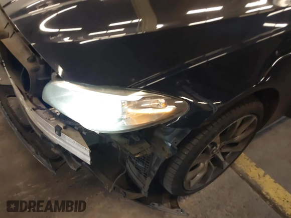2014 BMW 5 Series 535i with VIN WBA5B1C54ED477539, listed as a IAAI auction lot 40812585 with 94,541 mi miles and . Bid and sale history available at DreamBid. Image 22.