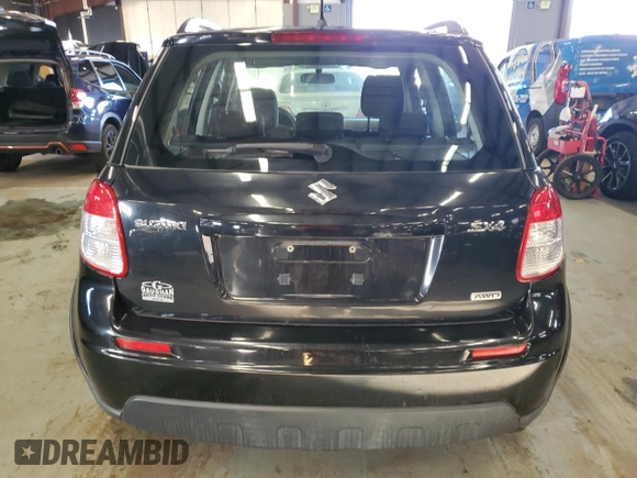 2010 Suzuki SX4 z VIN JS2YB5A36A6300326, wystawiony jako Copart lot #84372804 z przebiegiem 51 036 mil mil oraz Tytuł czysty. Historia ofert i sprzedaży dostępna na DreamBid. Obrazek 6.
