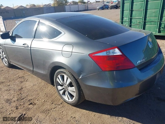 2009 Honda Accord Cpe EX with VIN 1HGCS12719A000511, listed as a IAAI auction lot 41658940 with 247,271 mi miles. Bid and sale history available at carsss.com. Image 3.