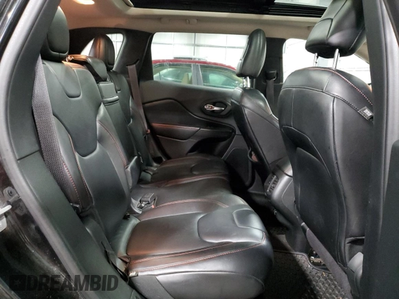 2014 Jeep Cherokee Trailhawk with VIN 1C4PJMBS5EW294212, listed as a Copart auction lot 88816885 with 151,779 mi miles and Salvage title. Bid and sale history available at DreamBid. Image 11.