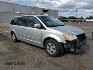 2012 Dodge Grand Caravan SXT with VIN 2C4RDGCG5CR327937, listed as a Copart auction lot 52905955 with 168,382 mi miles and Salvage Title. Bid and sale history available at DreamBid. Image 4.