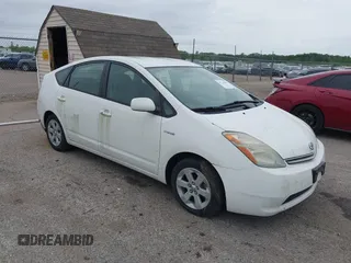 2006 Toyota Prius z VIN JTDKB20U967529741, wystawiony jako IAAI lot #42241095 z przebiegiem 211 511 mil mil oraz . Historia ofert i sprzedaży dostępna na DreamBid. Obrazek 1.