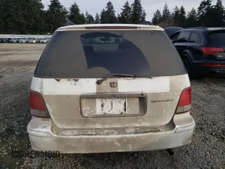 1998 Honda Odyssey with VIN RA31038664, listed as a Copart auction lot 43051785 with 106,084 mi miles and Salvage title. Bid and sale history available at DreamBid. Image 6.