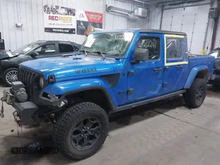 2021 Jeep Gladiator Willys with VIN 1C6HJTAG9ML535479, listed as a IAAI auction lot 41212241 with 81,044 mi miles and . Bid and sale history available at DreamBid. Image 23.