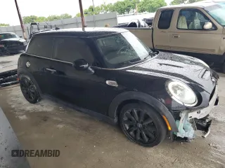 2017 MINI Hardtop Cooper S with VIN WMWXP7C51H2A45300, listed as a Copart auction lot 59216405 with 70,506 mi miles and Salvage title. Bid and sale history available at DreamBid. Image 4.