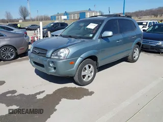 2006 Hyundai Tucson GL with VIN KM8JM12B76U276847, listed as a IAAI auction lot 41767240 with 204,713 mi miles. Bid and sale history available at carsss.com. Image 2.