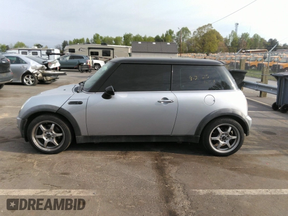 2002 MINI Hardtop with VIN WMWRC33432TE10226, listed as a IAAI auction lot 41973956 with 156,445 mi miles and . Bid and sale history available at DreamBid. Image 14.