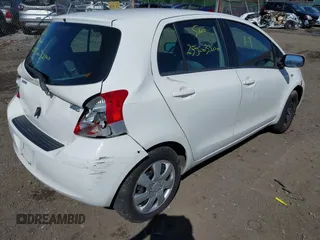 2009 Toyota Yaris with VIN JTDKT903X95244723, listed as a IAAI auction lot 41906848 with Not Provided miles. Bid and sale history available at carsss.com. Image 4.
