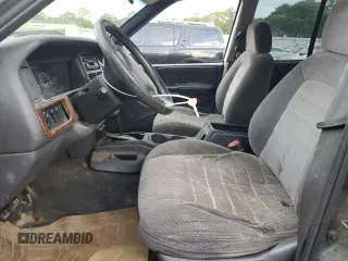 1995 Jeep Grand Cherokee Laredo with VIN 1J4FX58S0SC726476, listed as a Copart auction lot 69608784 with 264,705 mi miles and Salvage Title. Bid and sale history available at carsss.com. Image 7.