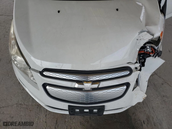 2015 Chevrolet Spark EV LT with VIN KL8CL6S0XFC704517, listed as a Copart auction lot 61424034 with 57,413 mi miles and Salvage Title. Bid and sale history available at carsss.com. Image 12.