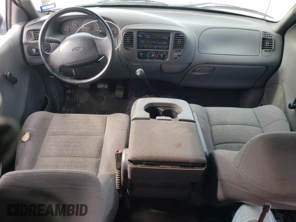 2002 Ford F-150 XL with VIN 1FTRX17282NA63790, listed as a Copart auction lot 42057394 with 158,054 mi miles and Salvage Title. Bid and sale history available at carsss.com. Image 8.