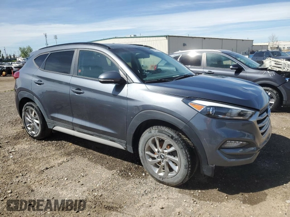 2018 Hyundai Tucson SEL with VIN KM8J3CA45JU745606, listed as a Copart auction lot 58669825 with 206,204 mi miles and Salvage title. Bid and sale history available at DreamBid. Image 4.