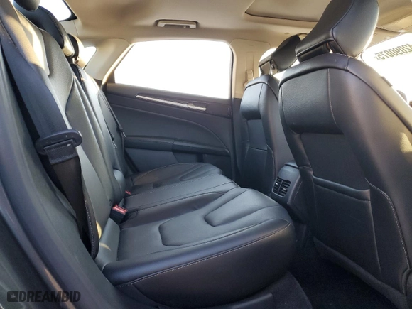 2020 Ford Fusion Plug-In Hybrid Titanium with VIN 3FA6P0SUXLR158328, listed as a Copart auction lot 42090075 with 49,788 mi miles and Salvage Title. Bid and sale history available at carsss.com. Image 10.