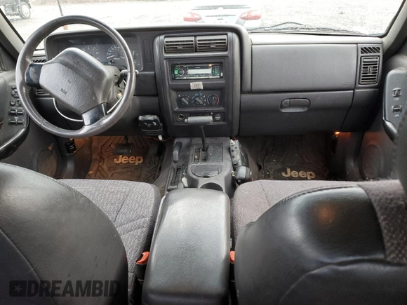 2000 Jeep Cherokee Classic with VIN 1J4FF58S3YL104384, listed as a Copart auction lot 46645415 with 253,730 mi miles and Salvage Title. Bid and sale history available at carsss.com. Image 8.