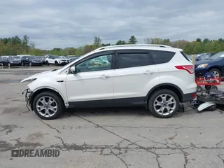 2016 Ford Escape Titanium with VIN 1FMCU9J98GUA00832, listed as a IAAI auction lot 42188941 with 90,764 mi miles and . Bid and sale history available at DreamBid. Image 14.