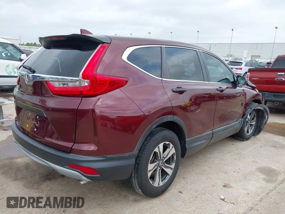 2019 Honda CR-V LX with VIN 2HKRW5H38KH409192, listed as a IAAI auction lot 41963242 with 38,114 mi miles. Bid and sale history available at carsss.com. Image 4.