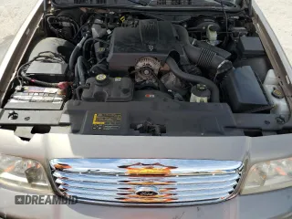 2003 Ford Crown Victoria LX с VIN 2FAHP74W63X124565, выставлен на аукционе Copart как лот 71051034 с пробегом 89 976 миль миль и Списание • Salvage title. История ставок и продаж доступна на DreamBid. Изображение 11.