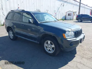 2007 Jeep Grand Cherokee Laredo z VIN 1J8GR48K47C513691, wystawiony jako IAAI lot #42439671 z przebiegiem 194 418 mil mil oraz . Historia ofert i sprzedaży dostępna na DreamBid. Obrazek 1.