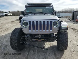 2018 Jeep Wrangler Unlimited Sahara z VIN 1C4HJXEG4JW285606, wystawiony jako Copart lot #49254405 z przebiegiem 57 148 mil mil oraz Szkoda całkowita • Salvage title. Historia ofert i sprzedaży dostępna na DreamBid. Obrazek 5.