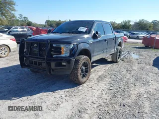 2019 Ford F-150 XL with VIN 1FTEW1E42KFC84494, listed as a IAAI auction lot 41648646 with 94,610 mi miles. Bid and sale history available at carsss.com. Image 2.