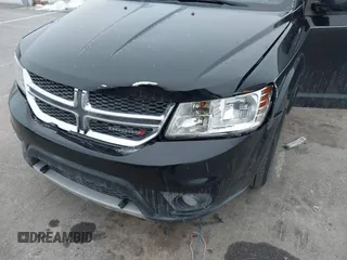 2014 Dodge Journey SXT with VIN 3C4PDCBG9ET259028, listed as a IAAI auction lot 41400287 with 192,979 mi miles and . Bid and sale history available at DreamBid. Image 6.