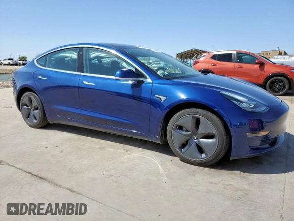 2020 Tesla Model 3 Long Range with VIN 5YJ3E1EB6LF617634, listed as a Copart auction lot 87010814 with 72,916 mi miles and Salvage Title. Bid and sale history available at carsss.com. Image 4.