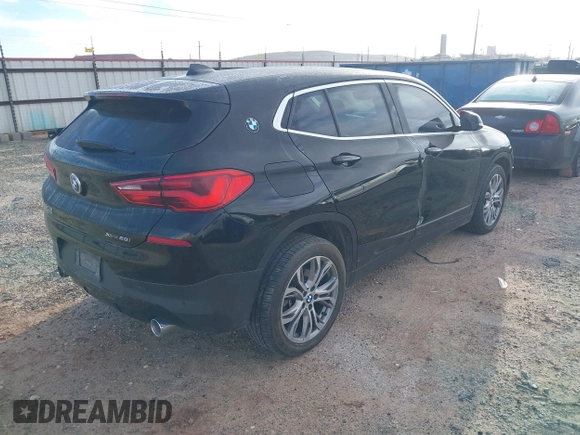 2020 BMW X2 xDrive28i with VIN WBXYJ1C02L5P31038, listed as a IAAI auction lot 41338219 with 72,854 mi miles. Bid and sale history available at carsss.com. Image 4.